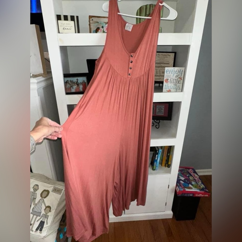 Coral/orange romper boutique large
